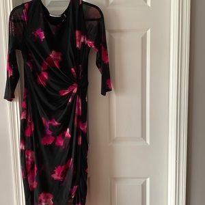 Tahari- beautiful black and floral dress.Lined, sheer sleeves. No flaws.